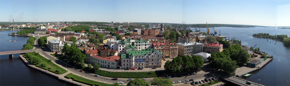 View on an old city from a tower of the Vyborg lock, a picture.