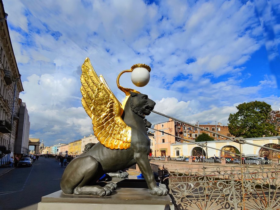 Golden Wings Sculpture on the Bridge in St. Petersburg